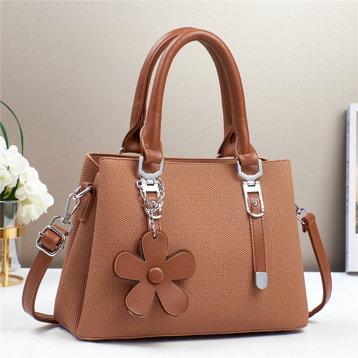 Womens Fashionable Textured Handbag with Flower Charm